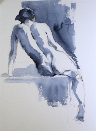 A nude sitting on a table